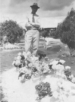 James Elbert Self standing by wife's grave