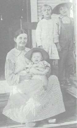 Emma (Self) Peterson with children, Dorris and Lawrence
